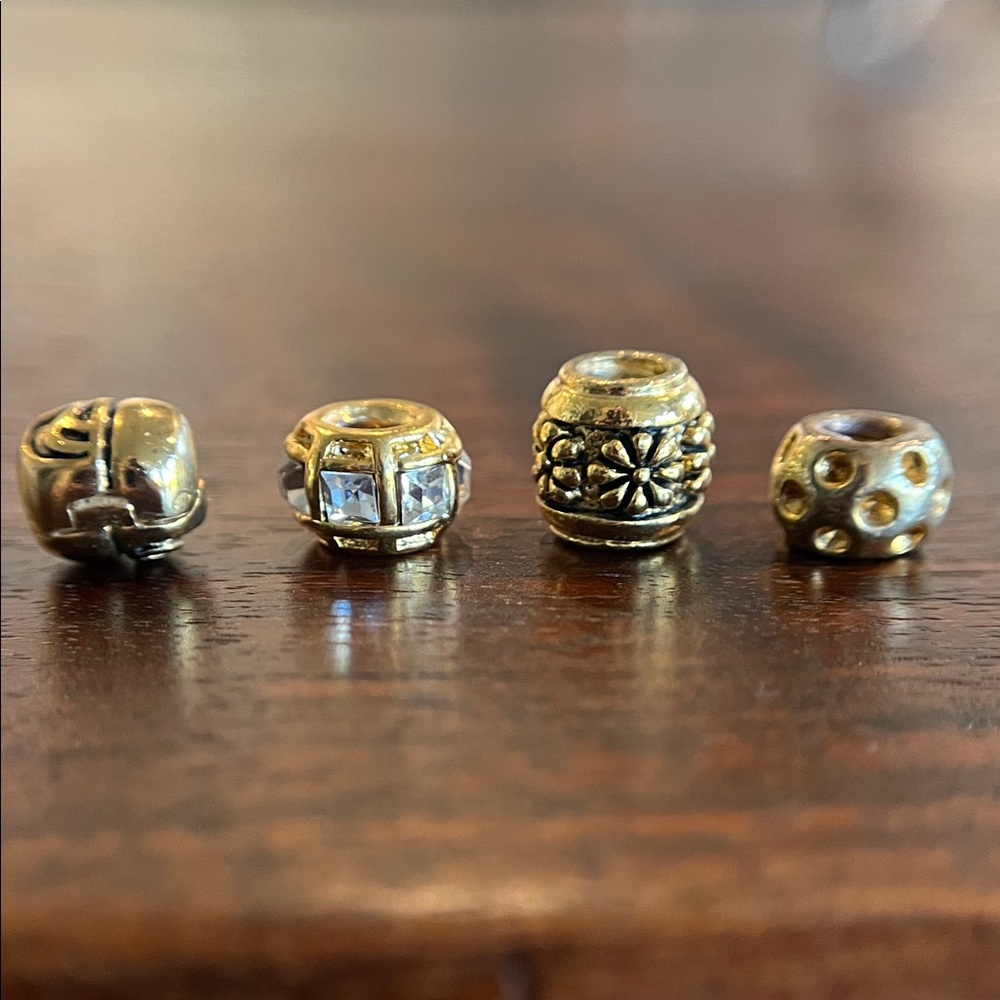 Bundle of gold Pandora-style beads